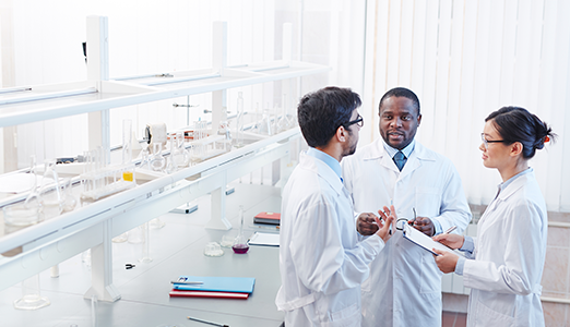 chemists working in their lab as a team