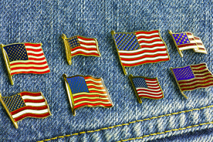 american flag pins on a jean jacket