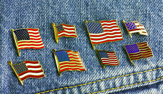 american flag pins on a jean jacket
